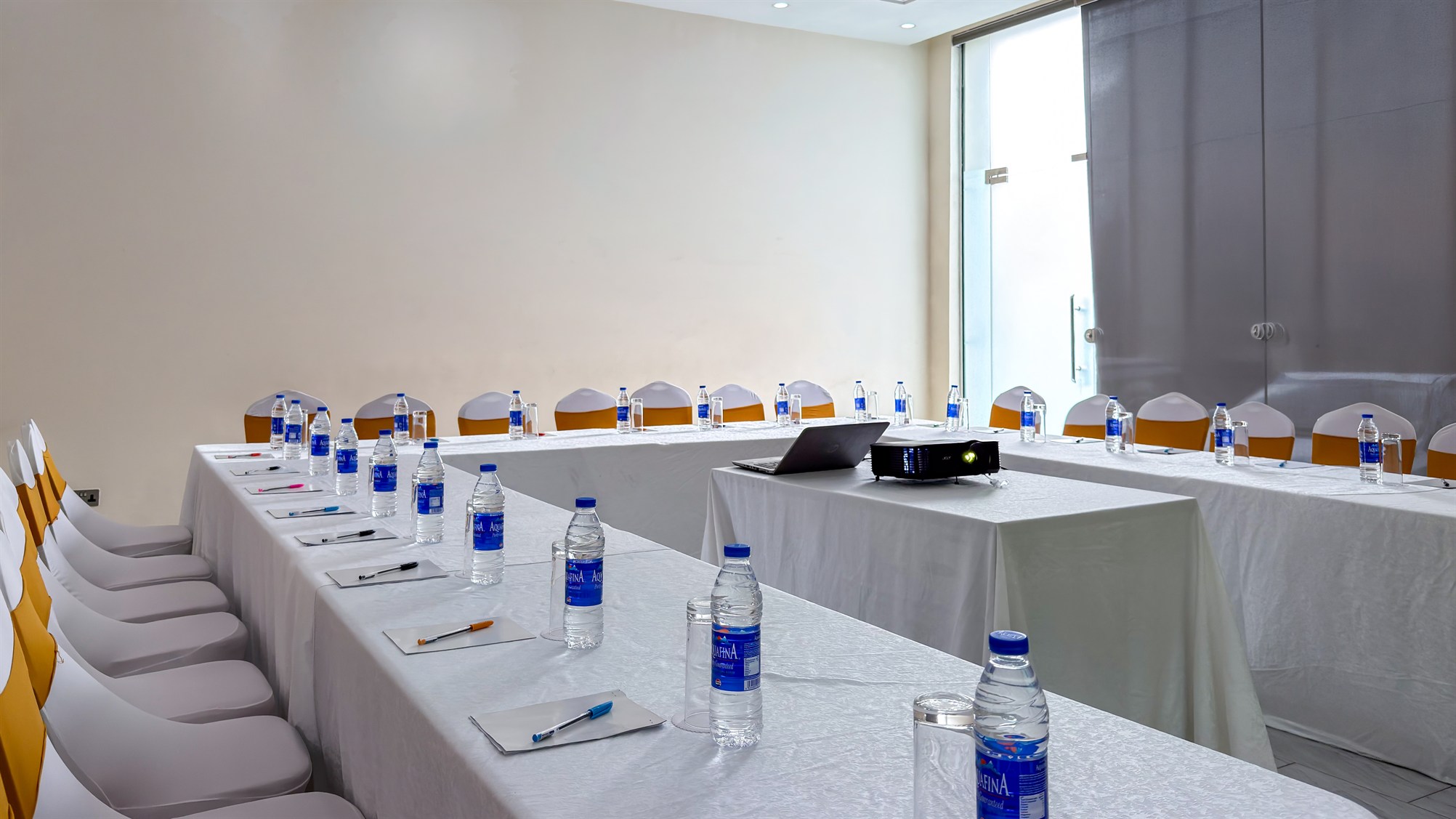 A meeting room laid for a working session