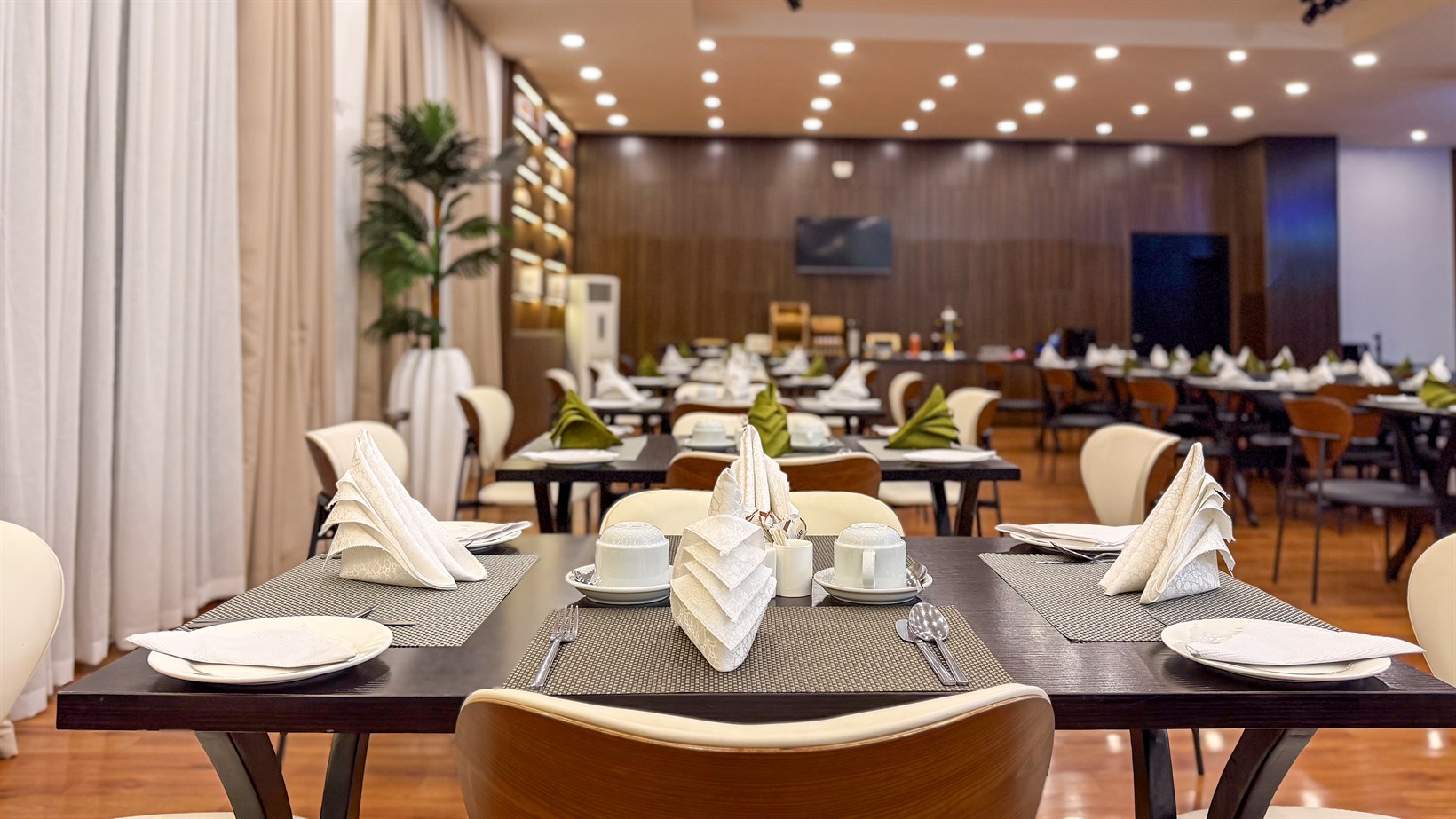 Restaurant tables laid for service